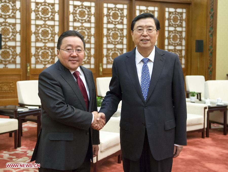 Zhang Dejiang (R), chairman of the Standing Committee of the National People's Congress of China, meets with Mongolian President Tsakhiagiin Elbegdorj in Beijing, capital of China, Nov. 9, 2014. 