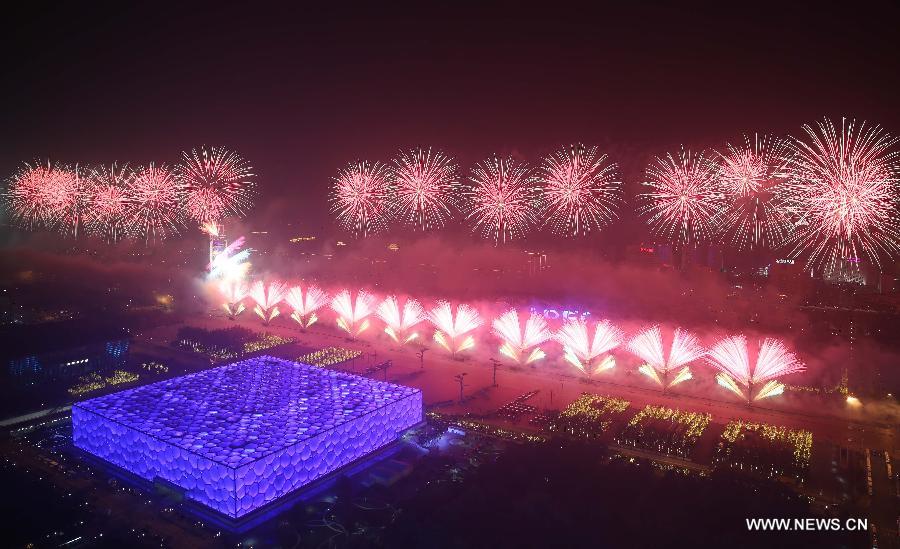 Fireworks explode over the Olympic Park in Beijing, China, Nov. 10, 2014. The 22nd Asia-Pacific Economic Cooperation (APEC) Economic Leaders' Meeting takes place in Beijing from Nov. 10 to 11.