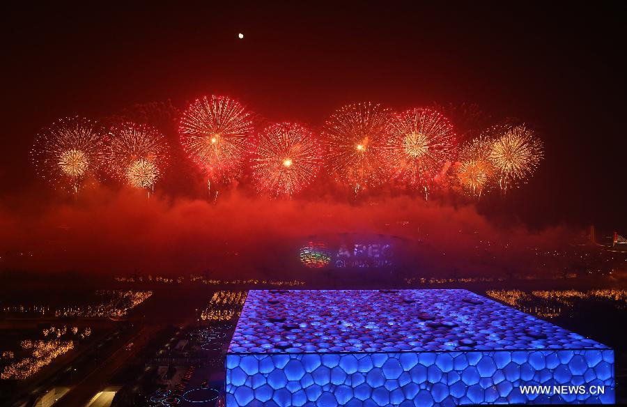 Fireworks explode in the sky over the Olympic Park in Beijing, China, Nov. 10, 2014.