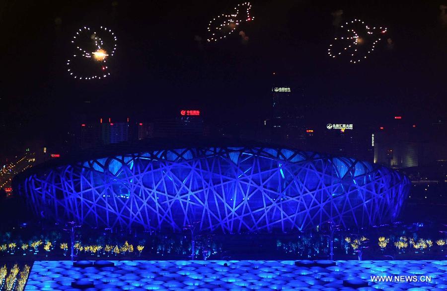 Fireworks explode over the Olympic Park in Beijing, China, Nov. 10, 2014. The 22nd Asia-Pacific Economic Cooperation (APEC) Economic Leaders' Meeting takes place in Beijing from Nov. 10 to 11.