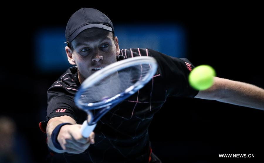 Tomas Berdych of the Czech Republic gestures to the audience after the ATP World Tour Finals Group match against Marin Cilic of Croatia in London, Britain, on Nov. 12, 2014.