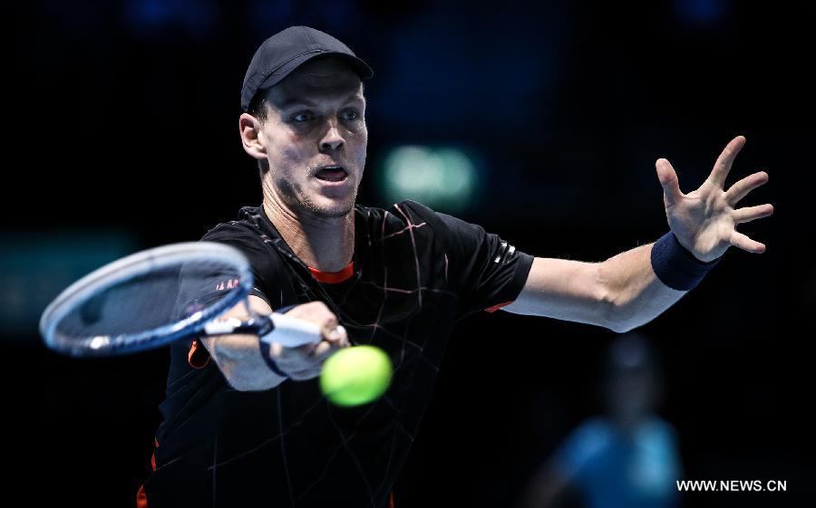 Tomas Berdych of the Czech Republic gestures to the audience after the ATP World Tour Finals Group match against Marin Cilic of Croatia in London, Britain, on Nov. 12, 2014.