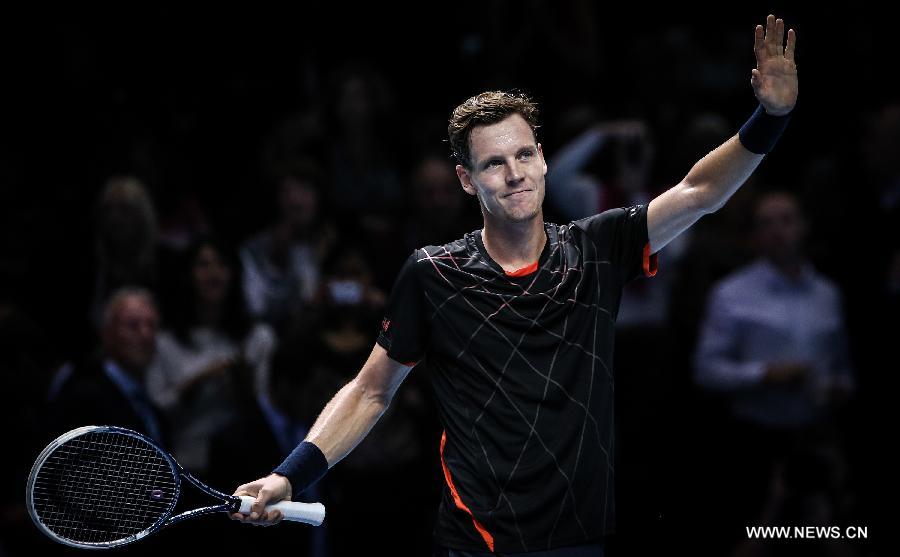 Tomas Berdych of the Czech Republic gestures to the audience after the ATP World Tour Finals Group match against Marin Cilic of Croatia in London, Britain, on Nov. 12, 2014.