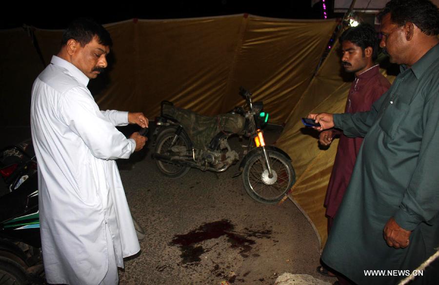 At least eight people were injured in a grenade attack on a political party camp in Karachi on Friday night, local media reported. 