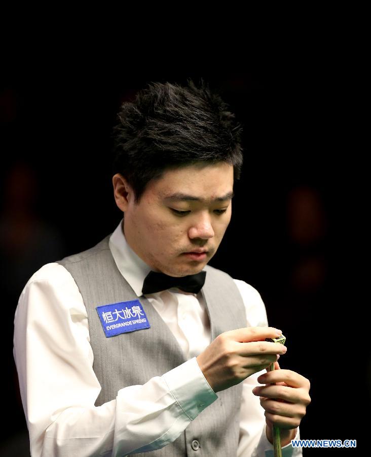 Ding Junhui of China competes during the Snooker UK Championship 2014 first round match against John Sutton of Ireland at the York Barbican Center in York, England, on November 26, 2014. Ding Junhui won 6-0 and was qualified for the second round.