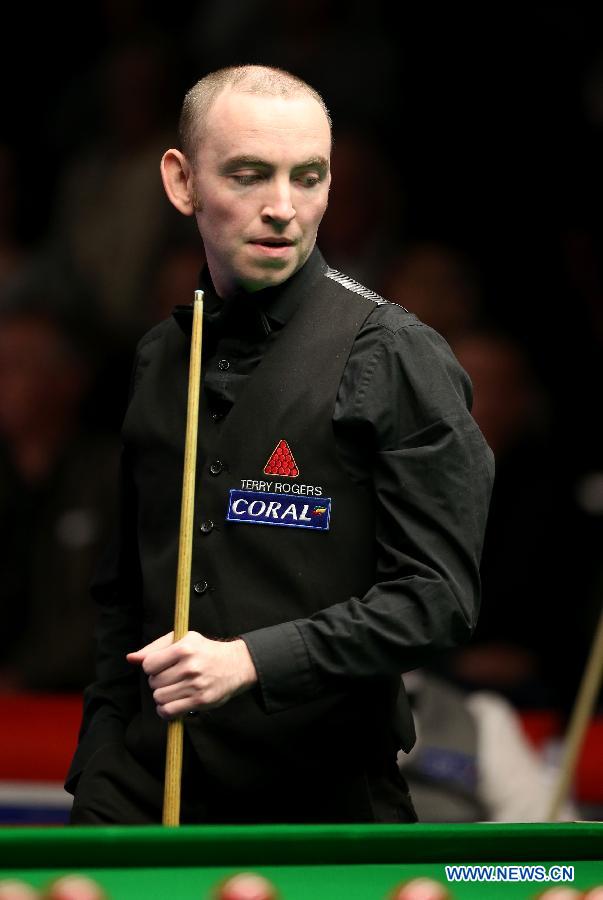 Ding Junhui of China competes during the Snooker UK Championship 2014 first round match against John Sutton of Ireland at the York Barbican Center in York, England, on November 26, 2014. Ding Junhui won 6-0 and was qualified for the second round.