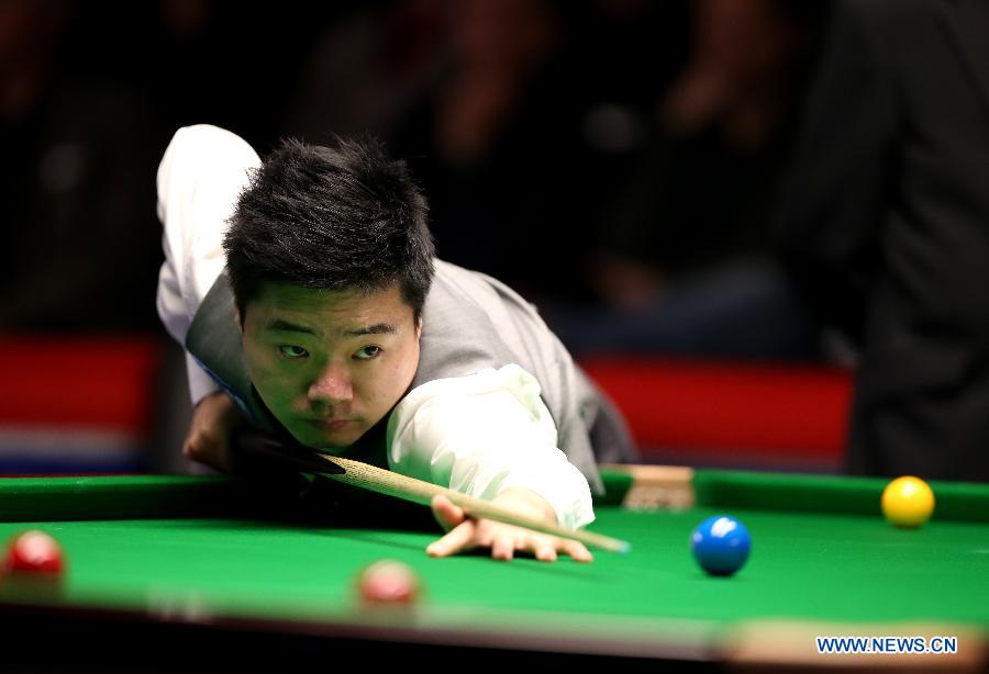 Ding Junhui of China competes during the Snooker UK Championship 2014 first round match against John Sutton of Ireland at the York Barbican Center in York, England, on November 26, 2014. Ding Junhui won 6-0 and was qualified for the second round.