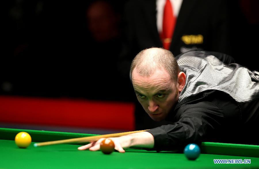 Ding Junhui of China competes during the Snooker UK Championship 2014 first round match against John Sutton of Ireland at the York Barbican Center in York, England, on November 26, 2014. Ding Junhui won 6-0 and was qualified for the second round.