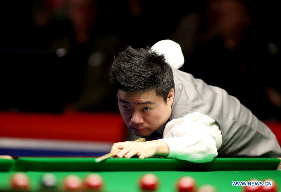 Ding Junhui of China competes during the Snooker UK Championship 2014 first round match against John Sutton of Ireland at the York Barbican Center in York, England, on November 26, 2014. Ding Junhui won 6-0 and was qualified for the second round.