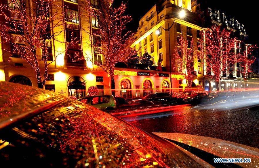 Photo taken on Nov. 25, 2014 shows the Christmas lights along the Champs-Elysees in Paris, France. 