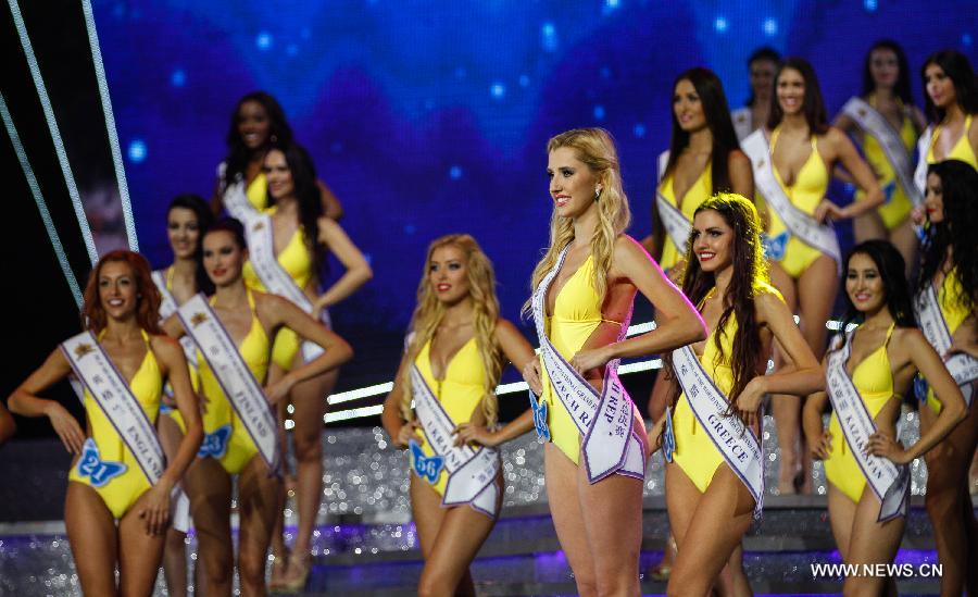 Models perform during the contest in Shenzhen, China, on Nov. 29, 2014.