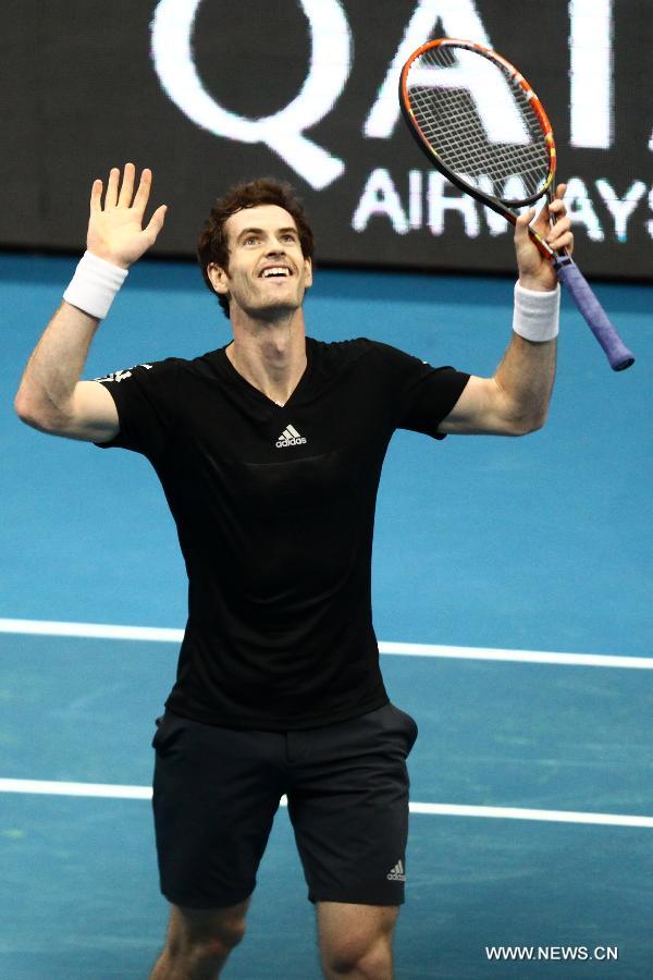 Manila Mavericks player Andy Murray of Britain celebrates after the men's singles match against DBS Singapore Slammers player Nick Kyrgios of Australia in the International Premier Tennis League in Pasay City, the Philippines, on Nov. 30. 2014. 