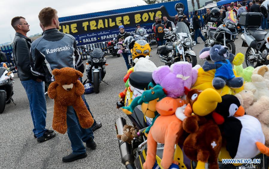 The event, which has 32 years history, attracted nearly 15,000 motorcyclists to take part in this year. More than 25,000 toys and stationary items have been donated by the motorcycle enthusiasts and the crowds.