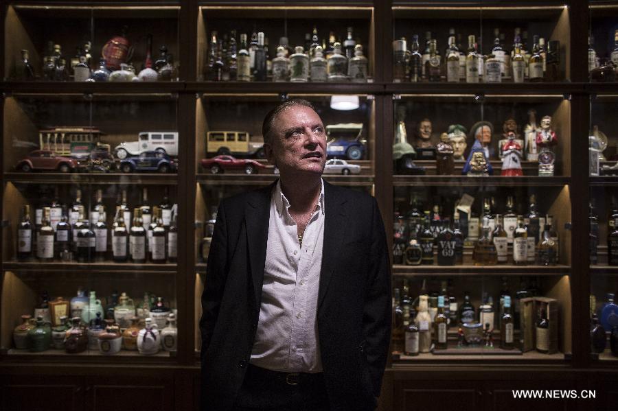 Miguel Angel Reigosa, president of the whisky club, 'Whiske Malt Argentina', poses in the Museum of Whisky in Buenos Aires, capital of Argentina, on Dec. 4, 2014.