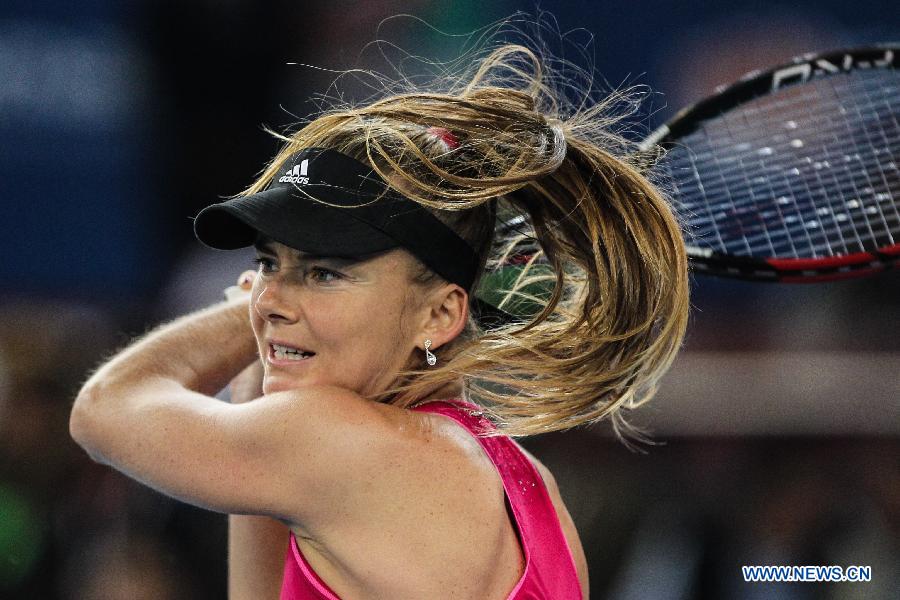 Daniela Hantuchova of Singapore Slammers returns the ball during the match against Kirsten Flipkens of Manila Mavericks at the Indian Leg of the International Premier Tennis League in New Delhi, India, Dec. 8, 2014. Manila Mavericks won 23-17. (Xinhua/Zheng Huansong) 