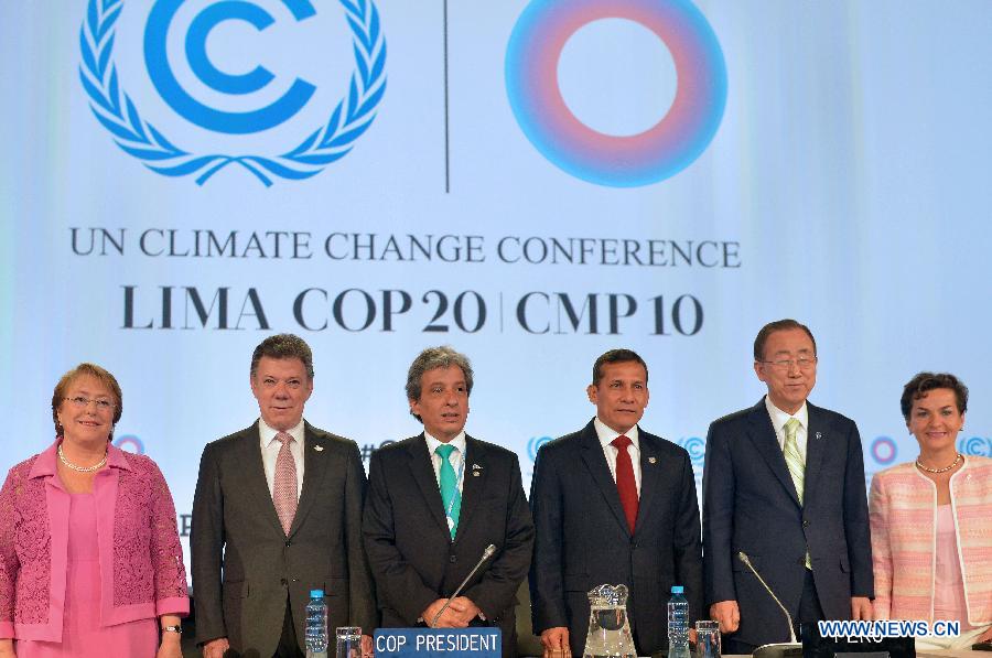 Image provided by Colombia's Presidency shows Colombian President Juan Manuel Santos (2nd L) and his counterparts Michelle Bachelet (L) of Chile, Ollanta Humala (3rd R) of Peru, the Secretary General of the United Nations (UN), Ban Ki-moon (2nd R) and the President of the 20th Conference of the United Nations on Climate Change (COP20) Manuel Pulgar Vidal (3rd L), taking part in the COP20, in Lima, Peru, on Dec. 10, 2014. 