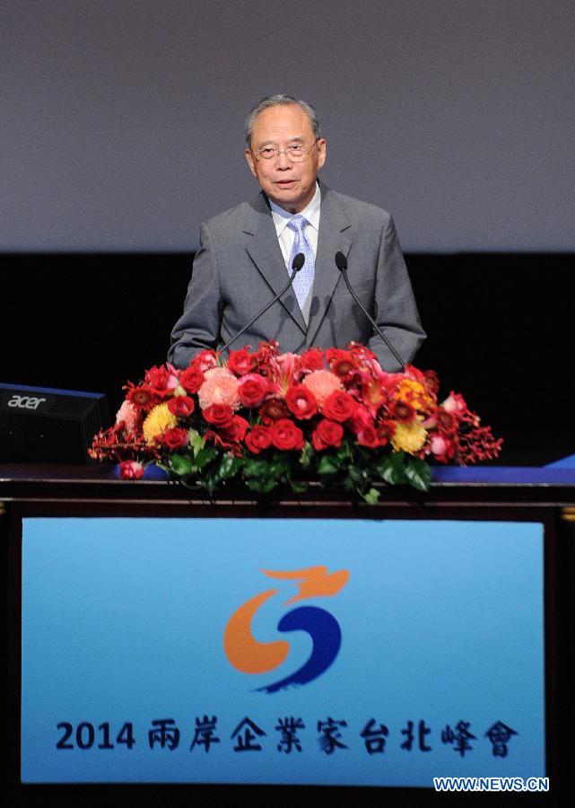 Zeng Peiyan, president of the mainland-based council of the Cross-Strait Entrepreneurs Summit, addresses the opening ceremony of the Cross-Strait Entrepreneurs Summit in Taipei, southeast China's Taiwan, Dec. 15, 2014. (Xinhua/Shen Hong)