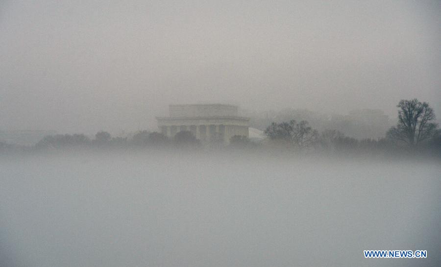 The Lincoln Memorial is seen through thick fog in Washington D.C., the United States, Dec. 24, 2014. The U.S. 