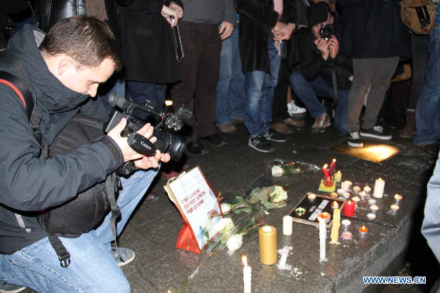 People attend a rally to protest against the deadly Paris shooting incident in Strasbourg, France, on Jan. 7, 2015.