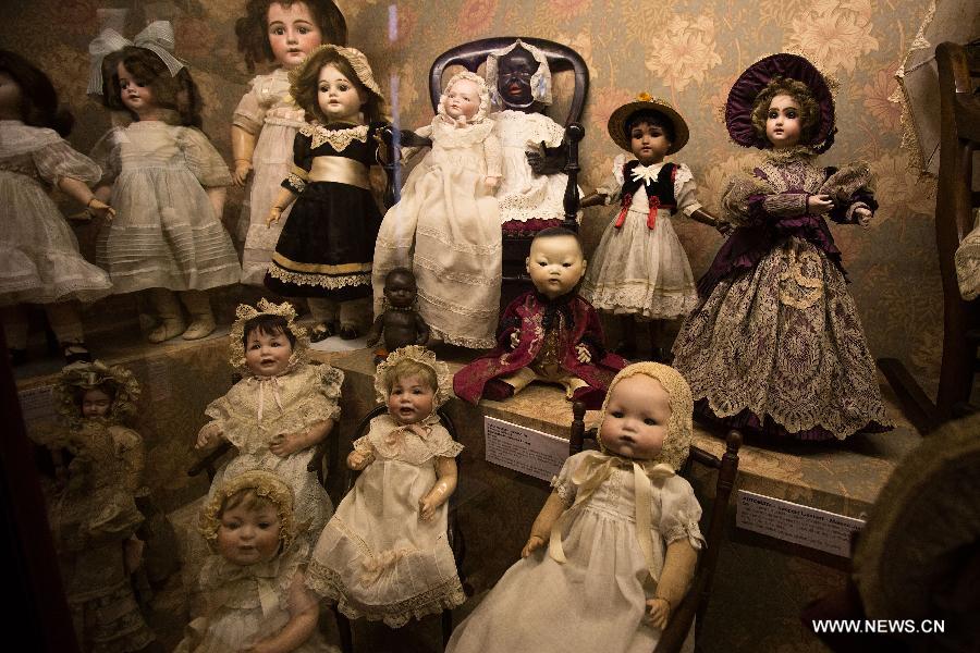 Ancient dolls are shown during the exhibit 'Once upon a time... Dolls and Toys (1870-1940)', in the Hispanic American Art Museum 'Isaac Fernandez Blanco', in Buenos Aires, Argentina, on Jan. 9, 2015.