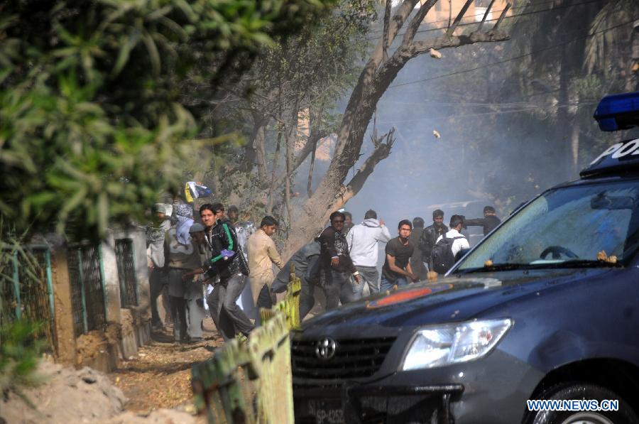 At least six people were injured on Friday afternoon in clashes between police and protesters as the latter marched toward the French Consulate against the printing of blasphemous caricatures by French journal Charlie Hebdo in Pakistan's southern port city of Karachi, local media reported.