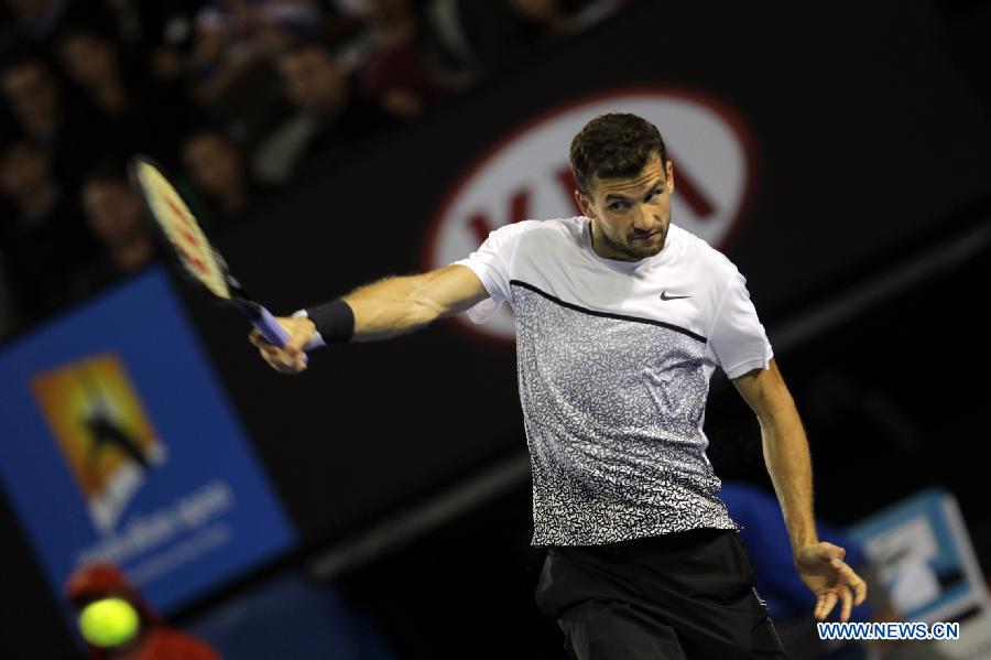 Grigor Dimitrov of Bulgaria reutrns a shot during his men's singles fourth round match against Andy Murray of Britain on day seven of 2015 Australian Open tennis tournament at Melbourne Park in Melbourne, Australia, Jan. 25, 2015. Murray won 3-1