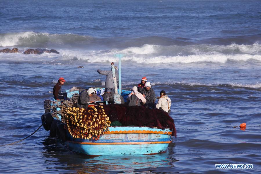 Fishermen fish on the Mediterranean by the fisher-town El Max in Alexandria, Egypt, on Jan. 31, 2015. 