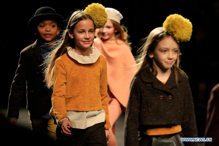 Children models present creations of CND By Condor during the 15th '080 Barcelona Fashion' in Barcelona, Spain, Feb. 3, 2015. 