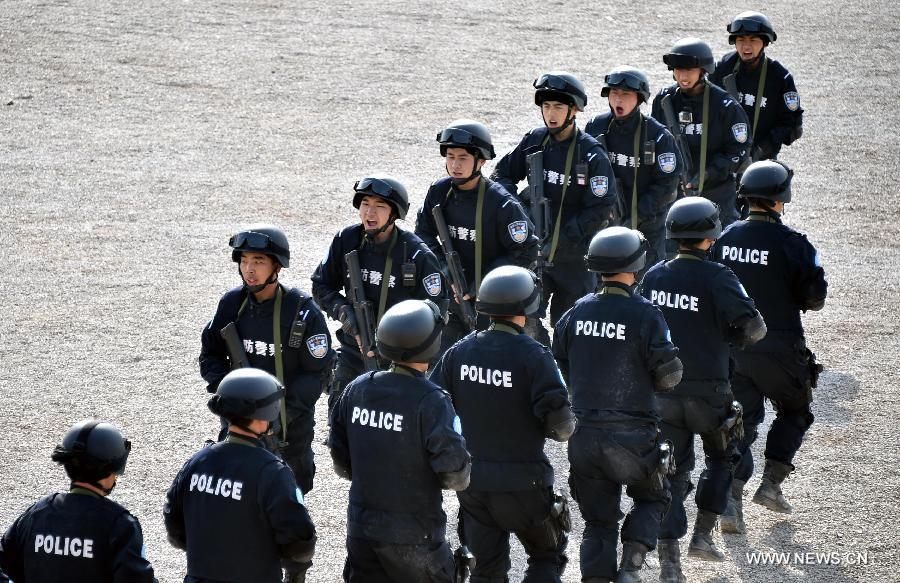 A total of 140 members of Chinese riot squad, who will start off in March for an eight-month United Nations peace-keeping mission in Liberia, took part in a drill in Jinan on Monday.