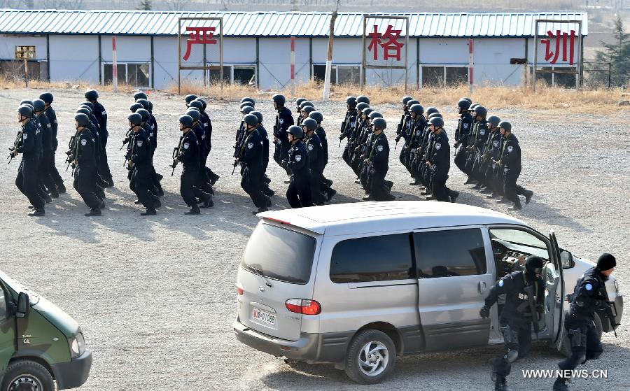 A total of 140 members of Chinese riot squad, who will start off in March for an eight-month United Nations peace-keeping mission in Liberia, took part in a drill in Jinan on Monday.