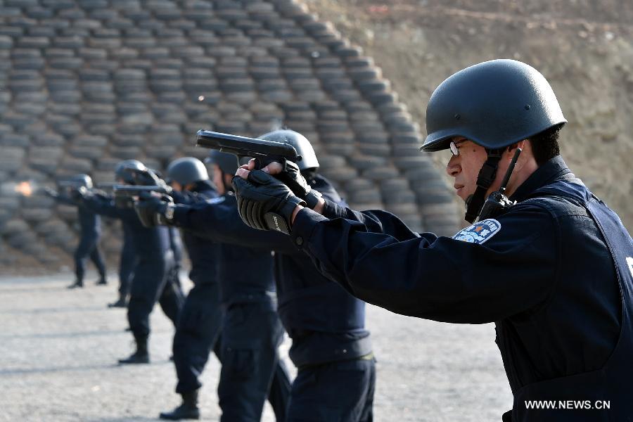 A total of 140 members of Chinese riot squad, who will start off in March for an eight-month United Nations peace-keeping mission in Liberia, took part in a drill in Jinan on Monday.