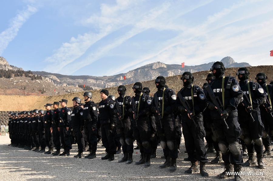 A total of 140 members of Chinese riot squad, who will start off in March for an eight-month United Nations peace-keeping mission in Liberia, took part in a drill in Jinan on Monday.