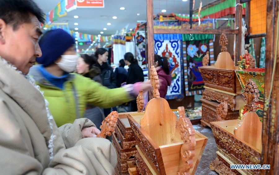 Tibetan people were busy with purchasing goods for the coming Tibetan New Year or Losar, which happens to fall on Feb. 19, the same day with Chinese Lunar New Year.