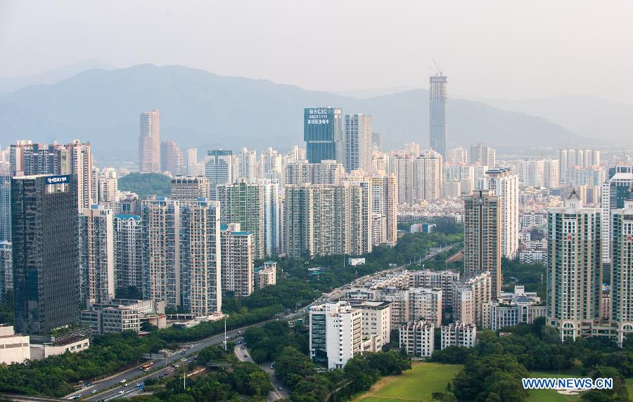 Photo taken on Oct. 8, 2014 shows residential apartment buildings in Shenzhen, south China's Guangdong Province. China's real estate market has continued a downward trend with new home prices in January registering month-on-month declines in most of surveyed cities. Of 70 large and medium-sized cities surveyed, 64 saw new home prices drop in January from the previous month, according to data released on Feb. 17, 2015 by the National Bureau of Statistics (NBS). Meanwhile, new home prices were flat in Shanghai, Nanjing, Nanchang and Guangzhou last month, while Shenzhen and Ganzhou saw prices rise 0.3 percent and 0.2 percent respectively from December, the NBS data showed.
