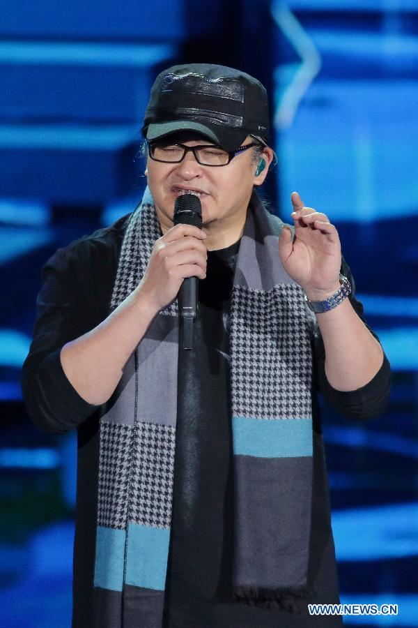 File photo shows singer Liu Huan performing during a rehearsal of the 2015 Spring Festival gala in Beijing, capital of China. 