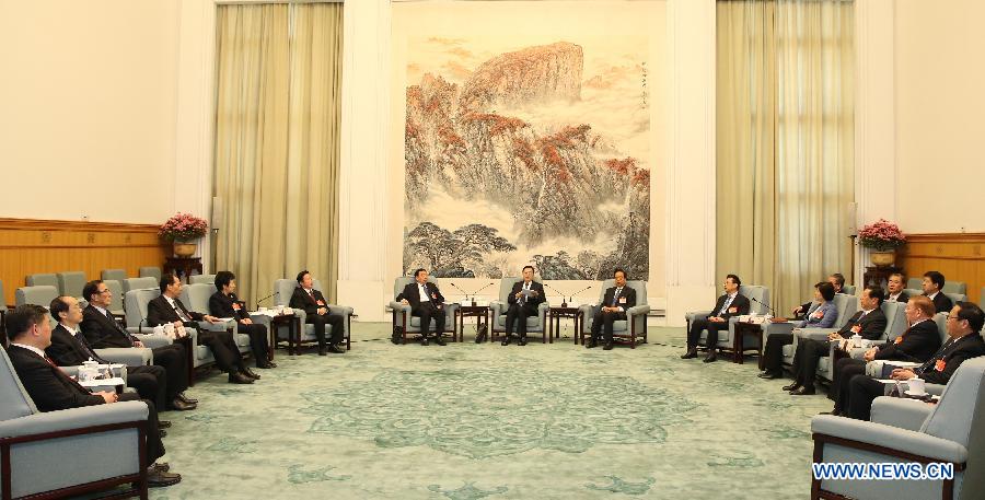  The 44th chairpersons' meeting of the 12th National People's Congress (NPC) Standing Committee is held at the Great Hall of the People in Beijing, capital of China, March 4, 2015. Zhang Dejiang, chairman of the Standing Committee of the 12th NPC, presided over the meeting. (Xinhua/Ma Zhancheng)