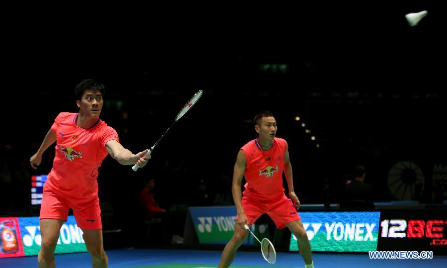 Fu Haifeng (L) and Zhang Nan of China compete during the men's doubles first round match between Fu Haifeng/Zhang Nan of China and Matthew Nottingham/Harley Towler of England at the All England Open Badminton Championships at Barclaycard Arena in Birmingham, Britain on March 4, 2015.