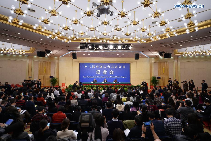 Xu Shaoshi, head of China's National Development and Reform Commission, gives a press conference for the third session of China's 12th National People's Congress (NPC) on the economic situation and macro-economic control in Beijing, capital of China, March 5, 2015. The third session of China's 12th NPC opened in Beijing on March 5. (Xinhua/Li Xin)