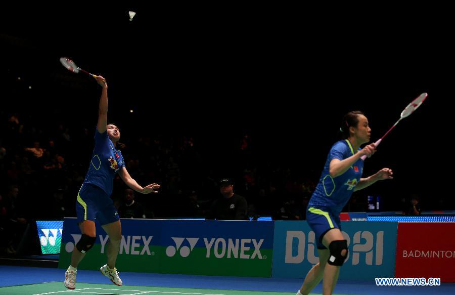 Tian Qing (L) and Zhao Yunlei of China compete during the women's doubles first round match between Tian Qing/Zhao Yunlei of China and Lee So Hee/Shin Seung Chan of Korea at the All England Open Badminton Championships at Barclaycard Arena in Birmingham, Britain on March 4, 2015.