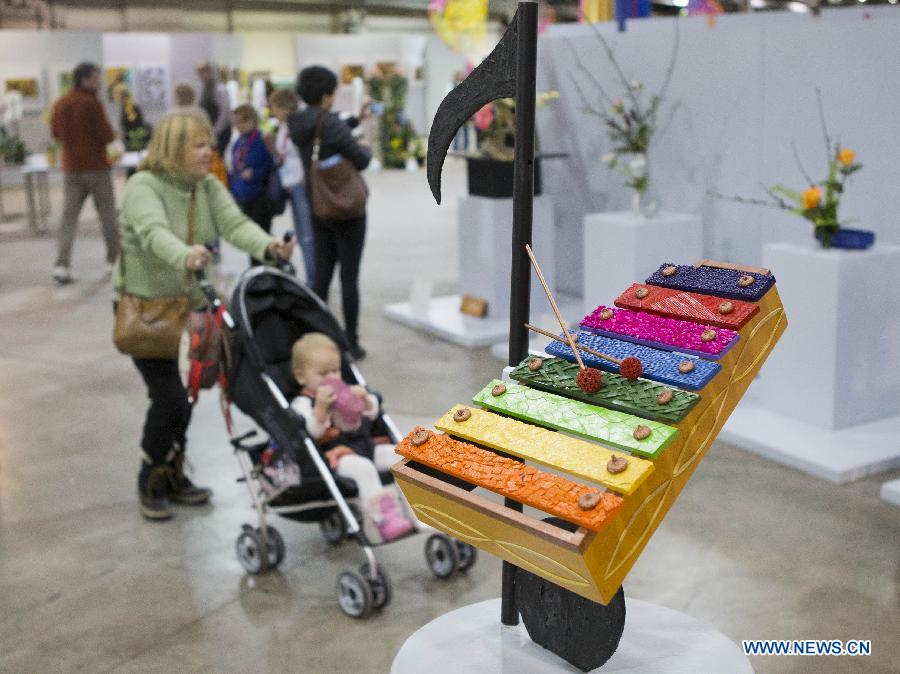 People visit the 2015 Canada Blooms in Toronto, Canada, March 13, 2015. 