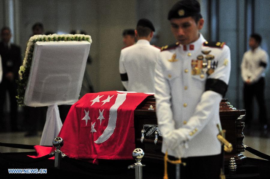 Singapore's founding Prime Minister Lee Kuan Yew's casket was transferred Wednesday from Sri Temasek, the prime minister's official residence on the Istana grounds, to Parliament House where his body will lie in state until Saturday.