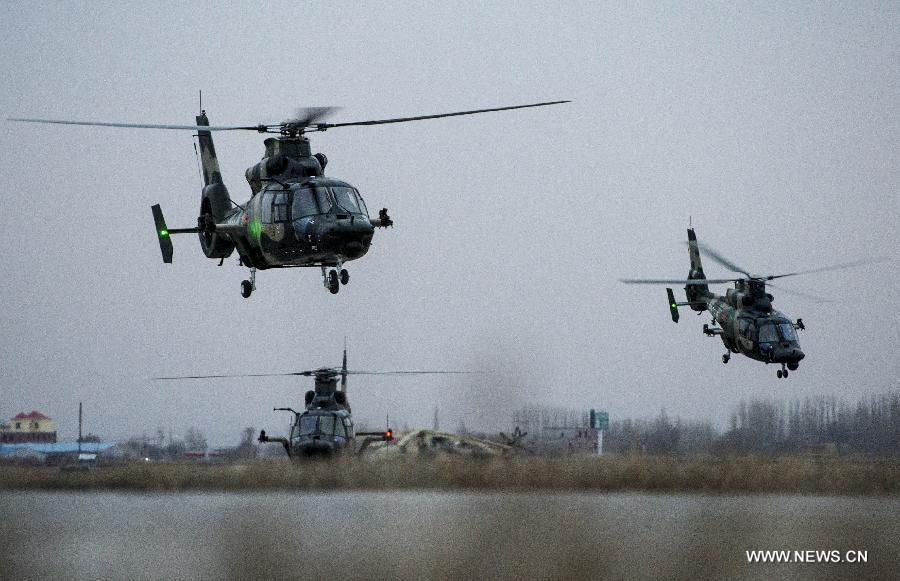  An army aviation brigade under the Xinjiang Military area command of the Chinese People's Liberation Army (PLA) conducted a day-night drill under actual combat conditions on Monday.