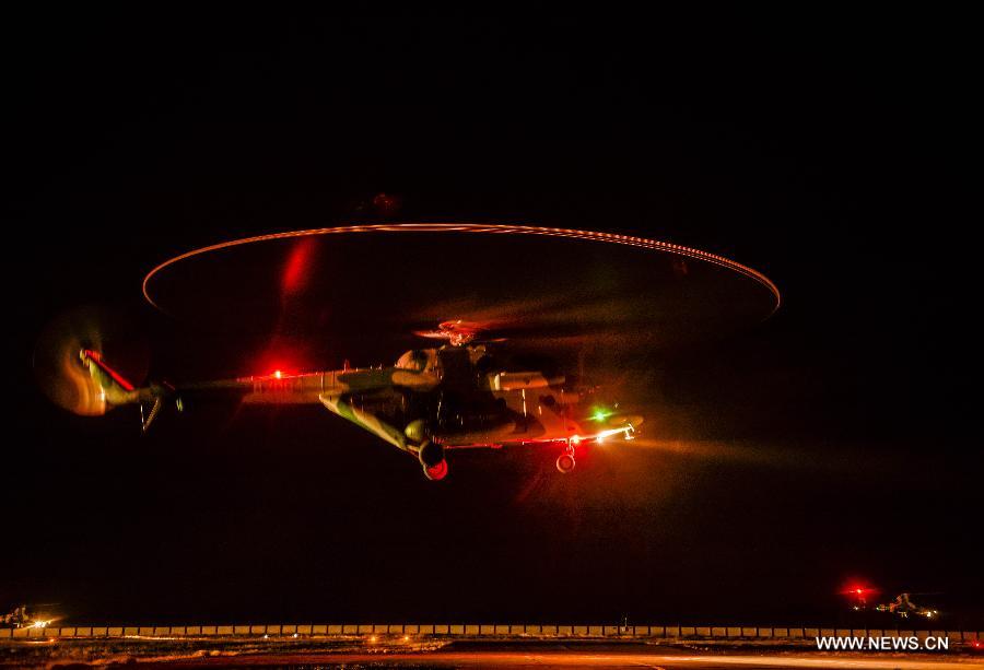  An army aviation brigade under the Xinjiang Military area command of the Chinese People's Liberation Army (PLA) conducted a day-night drill under actual combat conditions on Monday.