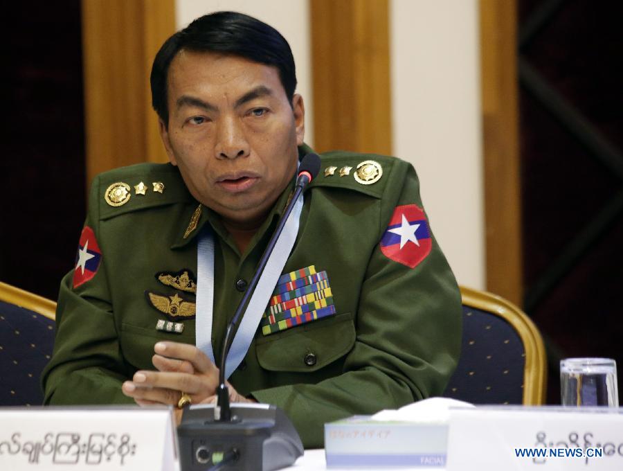 Myanmar Lieutenant-General Myint Soe speaks to media during a joint press briefing after the signing ceremony of draft of the Nationwide Cease-fire Agreement (NCA) between members of Myanmar government's Union Peace-Making Work Committee (UPWC) and the ethnic armed groups' National Ceasefire Coordination Team (NCCT) at the Myanmar Peace Center in Yangon, Myanmar, March 31, 2015.