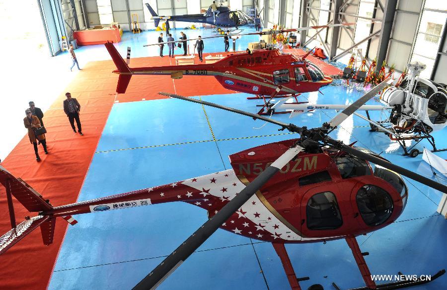 Helicopters for sale are seen at a helicopter store in Ningbo, east China's Zhejiang Province, April 8, 2015. The helicopter store was open on Wednesday. (Xinhua)