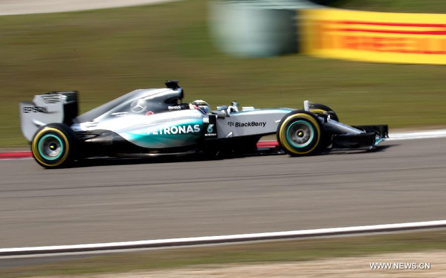 Mercedes AMG driver Lewis Hamilton of Britain drives during the Chinese Formula One Grand Prix at Shanghai International Circuit in Shanghai, China, April 12, 2015.