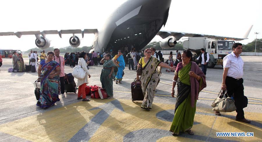 Indian nationals get off an Indian Air Force C-17 aircraft at Air Force Station in New Delhi, India, April 26, 2015.
