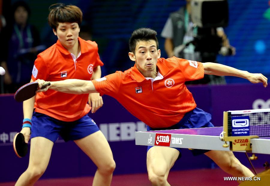 Hong Kong China's Wong Chun Ting/Doo Hoi Kem(L) compete against Japan's Niwa Koki/Hirano Sayaka during Mixed Doubles match at the 53rd Table Tennis World Championships in Suzhou, city of east China's Jiangsu Province, on April 29, 2015. Hong Kong China's Wong Chun Ting/Doo Hoi Kem won 4-0. (Xinhua/Yang Shiyao) 