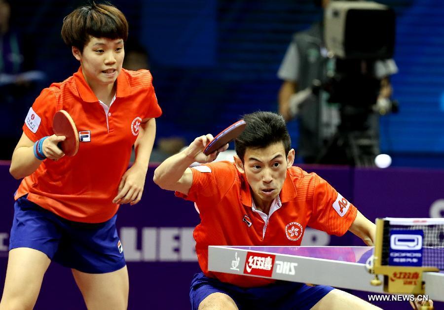 Hong Kong China's Wong Chun Ting/Doo Hoi Kem(L) compete against Japan's Niwa Koki/Hirano Sayaka during Mixed Doubles match at the 53rd Table Tennis World Championships in Suzhou, city of east China's Jiangsu Province, on April 29, 2015. Hong Kong China's Wong Chun Ting/Doo Hoi Kem won 4-0. (Xinhua/Yang Shiyao) 