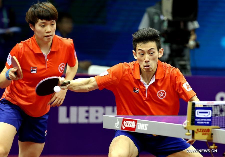 Hong Kong China's Wong Chun Ting/Doo Hoi Kem(L) compete against Japan's Niwa Koki/Hirano Sayaka during Mixed Doubles match at the 53rd Table Tennis World Championships in Suzhou, city of east China's Jiangsu Province, on April 29, 2015. Hong Kong China's Wong Chun Ting/Doo Hoi Kem won 4-0. (Xinhua/Yang Shiyao) 